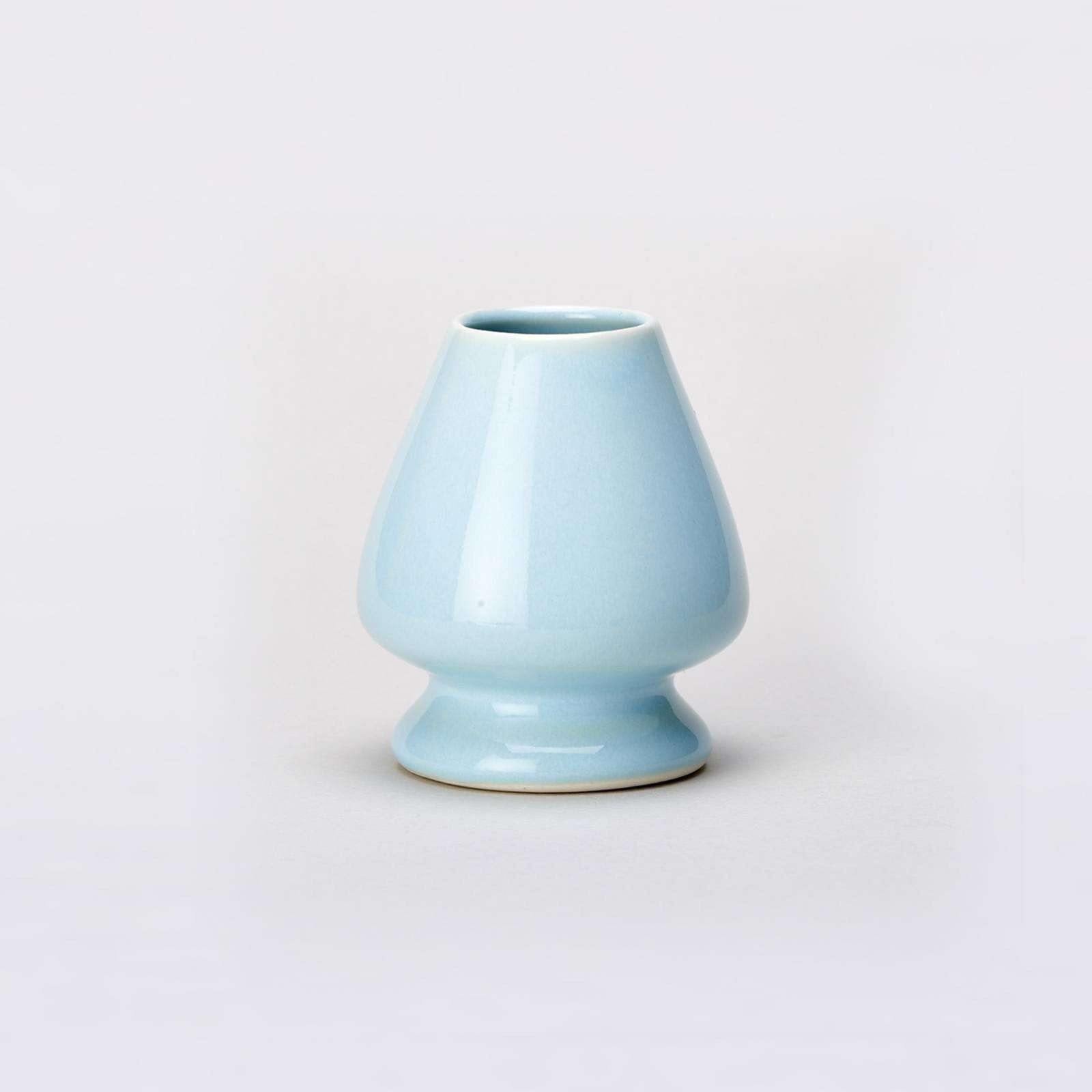 Blue Matcha Whisk stand on grey background